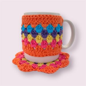 ORANGE COLORED MUG CASE AND COASTER